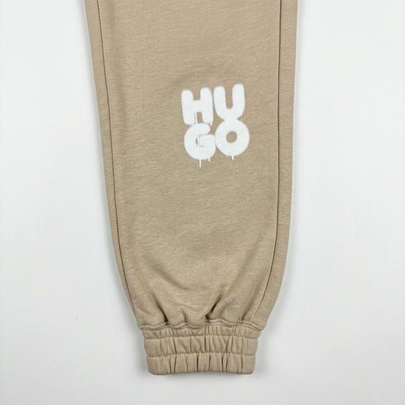 Beige joggers logo and cuff detail
