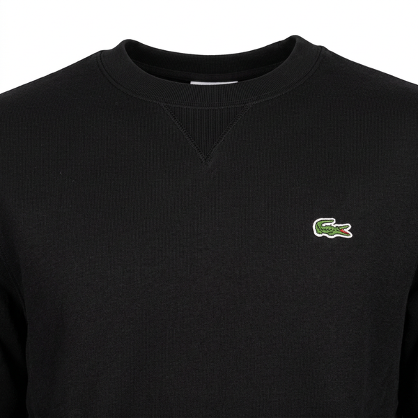 Black Lacoste sweatshirt chest close-up
