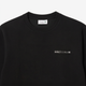 Black Lacoste sweatshirt close-up